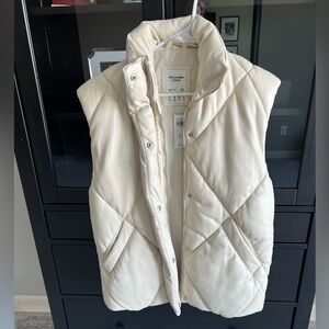Abercrombie cream tan faux leather vest new with tags never worn.